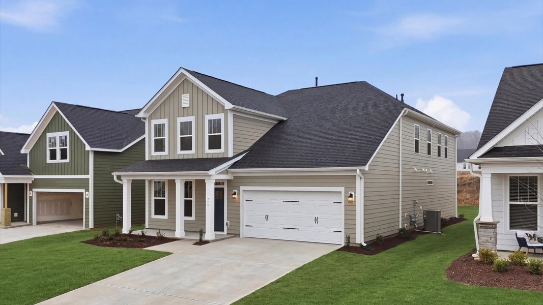 Front exterior of a new home in Mulberry Estates, Simpsonville, SC, highlighting curb appeal (Image 20). Front exterior of a new home in Mulberry Estates, Simpsonville, SC, highlighting curb appeal (Image 20).