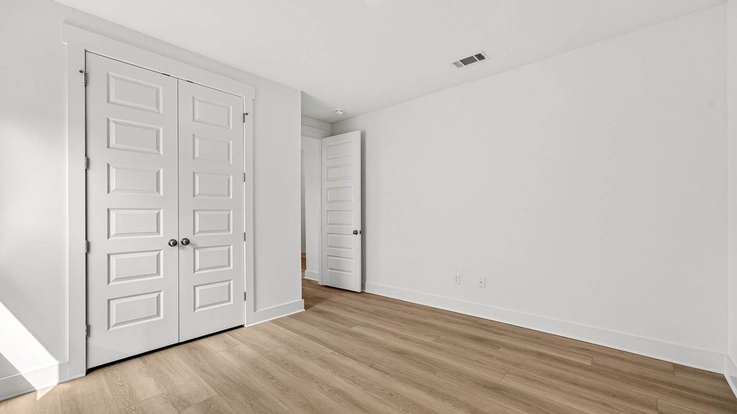 Spacious, unfurnished interior of a new home in WindMark Beach, Port Saint Joe (Image 28).