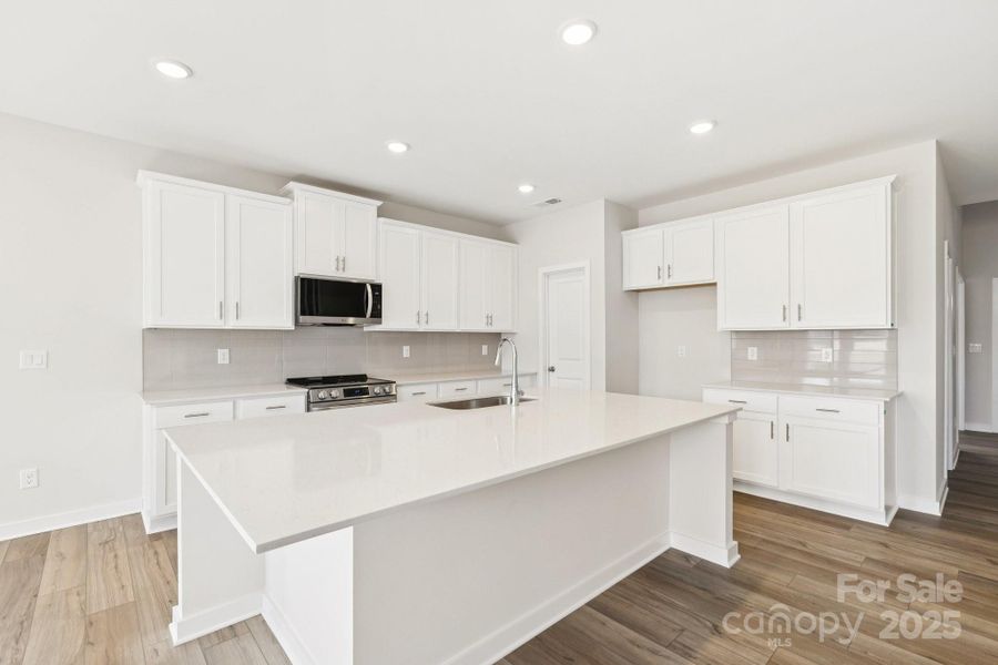 Furnished interior view inside a new home in Running Creek, Locust (Image 6).