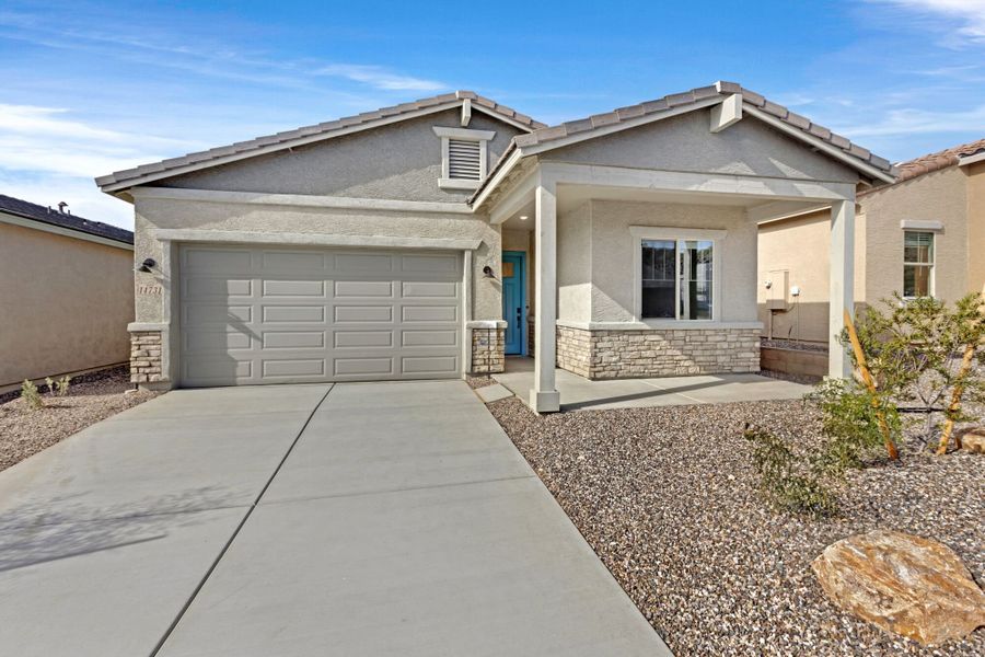 Front exterior of a new home in Saguaro Reserve II, Marana, AZ, highlighting curb appeal (Image 2).
