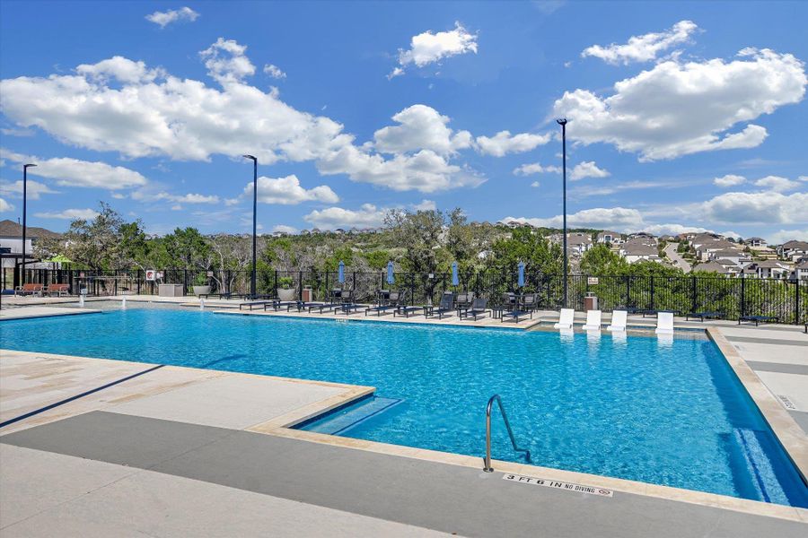 Enjoy a dip in the resort-style pool on a hot summer day with a splash pad for little ones