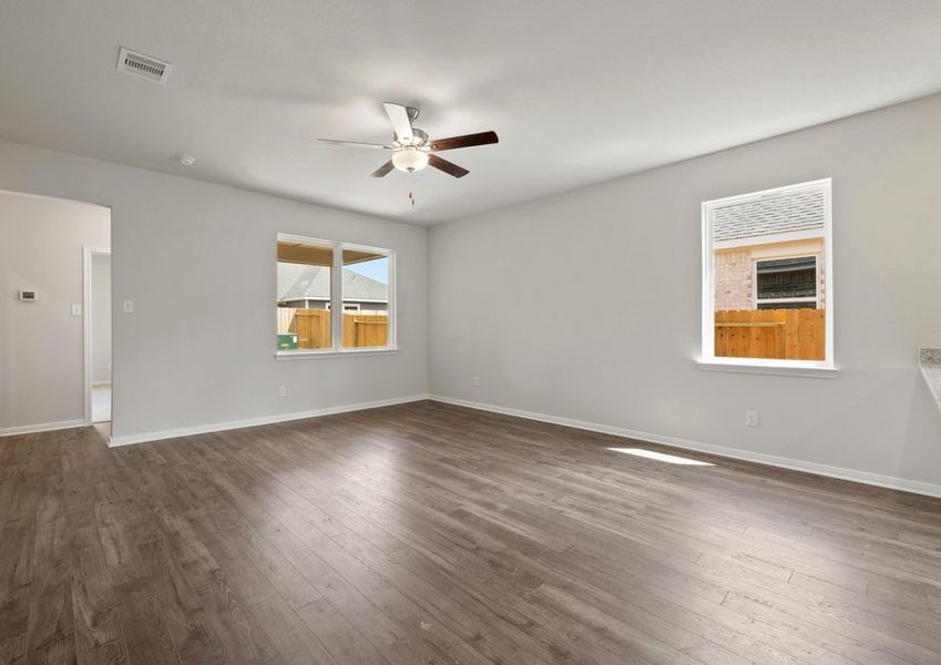 Spacious family room with a ceiling fan Spacious family room with a ceiling fan