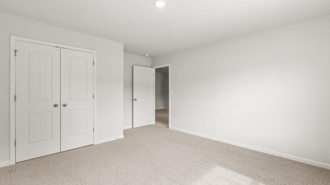 Spacious, unfurnished interior of a new home in Northwoods at Mirror Lake, Villa Rica (Image 22).