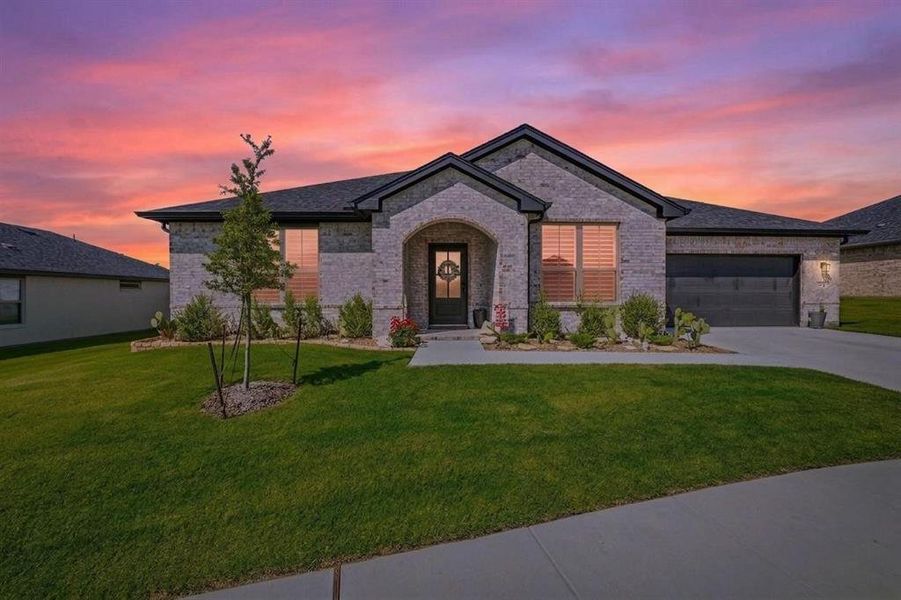 Front exterior of a new home in , Glen Rose, TX, highlighting curb appeal (Image 22). Front exterior of a new home in , Glen Rose, TX, highlighting curb appeal (Image 22).