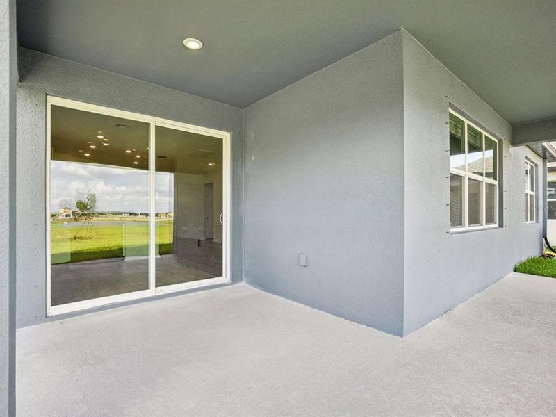 Exterior details and patio area of a home in Coasterra - Reserve Series, Palmetto (Image 1).