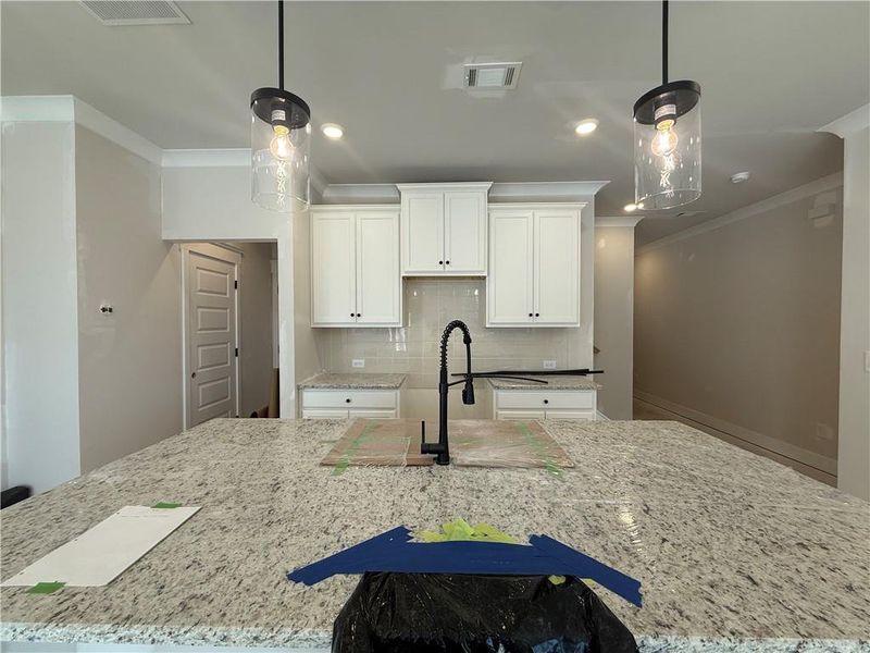 Furnished interior view inside a new home in The Towns at Auburn Station East, Auburn (Image 5).