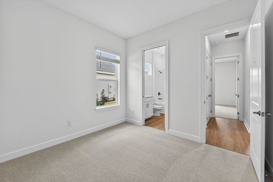 Representative unfurnished interior of a home built from the Sereno by Taylor Morrison in Esplanade by the Islands, Naples (Image 17).