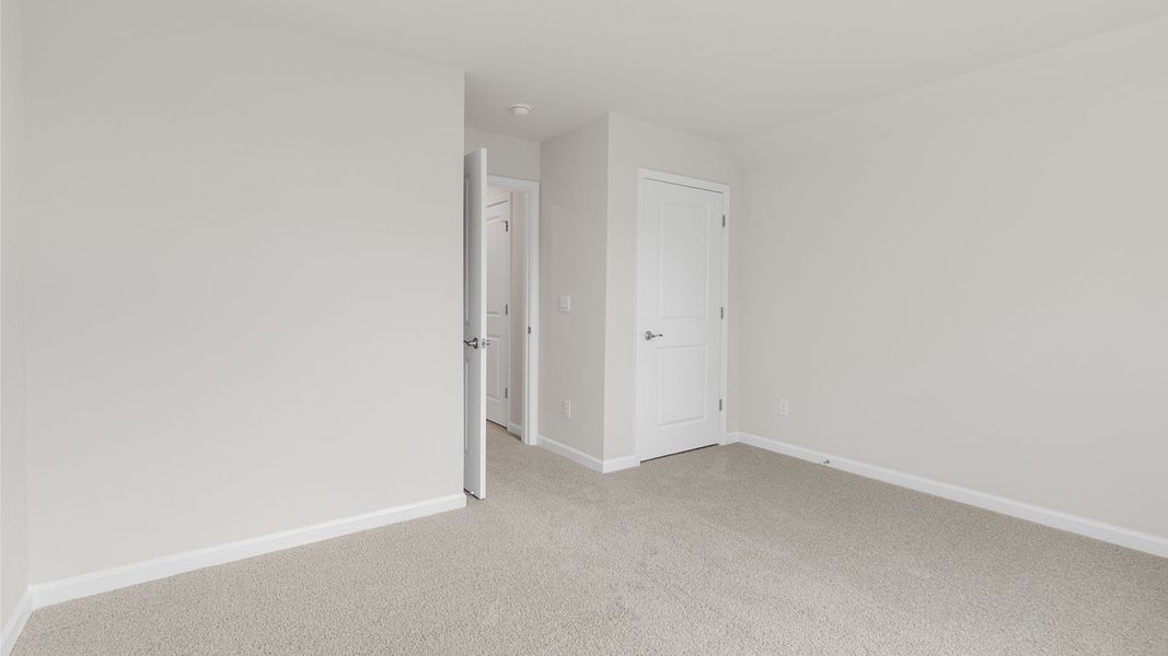 Spacious, unfurnished interior of a new home in The Villas at Kinsley, Jamestown (Image 22).