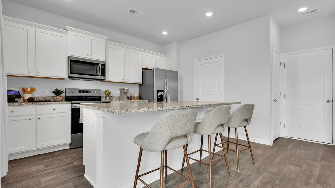 Representative furnished interior of a home built from the BELHAVEN by D.R. Horton in The Ranch, Holly Hill (Image 5). Representative furnished interior of a home built from the BELHAVEN by D.R. Horton in The Ranch, Holly Hill (Image 5).