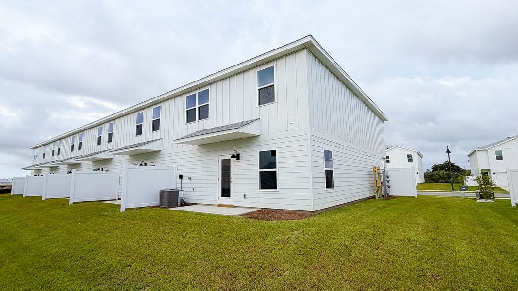 Exterior details and patio area of a home in Salt Creek Townhomes at Mexico Beach, Mexico Beach (Image 17). Exterior details and patio area of a home in Salt Creek Townhomes at Mexico Beach, Mexico Beach (Image 17).