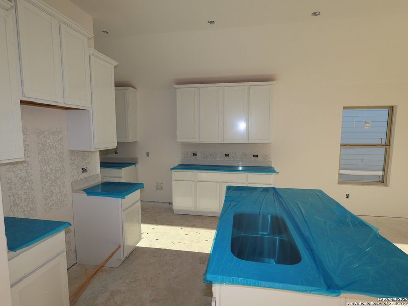 In-progress construction of a new home in Agave, San Antonio, TX (Image 22).