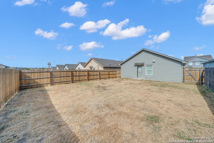Exterior details and patio area of a home in , Converse (Image 15). Exterior details and patio area of a home in , Converse (Image 15).