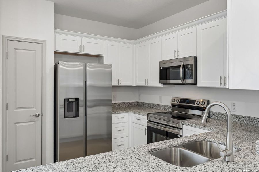 Furnished interior view inside a new home in Magnolia Village North, San Antonio (Image 13).