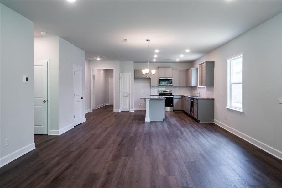 The Café Area opens to the Kitchen and main gathering area. The Café Area opens to the Kitchen and main gathering area.