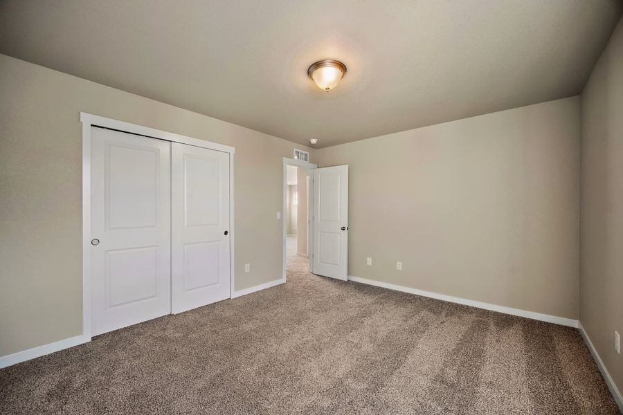 Spacious, unfurnished interior of a new home in Ridge at Lorson Ranch, Colorado Springs (Image 35).