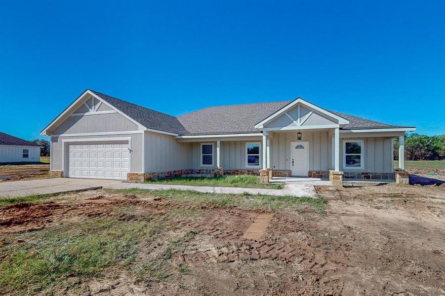 View of front of home with a garage