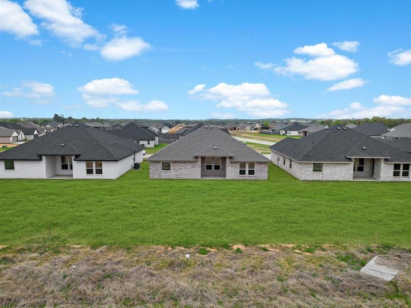 Exterior details and patio area of a home in , Tolar (Image 20).