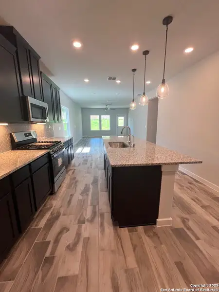 Furnished interior view inside a new home in The Meadows at Hunters Ranch, San Antonio (Image 3). Furnished interior view inside a new home in The Meadows at Hunters Ranch, San Antonio (Image 3).
