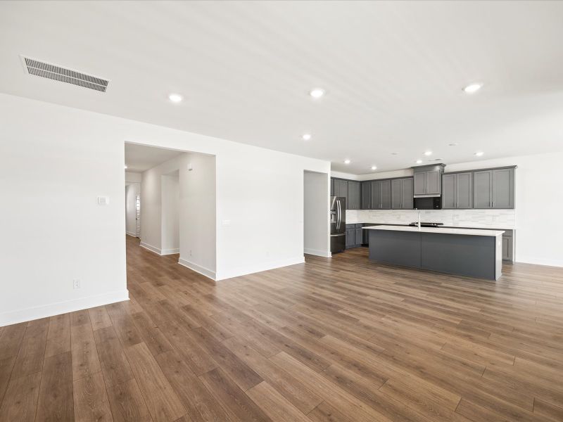 Spacious, unfurnished interior of a new home in The Coves at Lakes of Cane Bay II, Summerville (Image 16). Spacious, unfurnished interior of a new home in The Coves at Lakes of Cane Bay II, Summerville (Image 16).