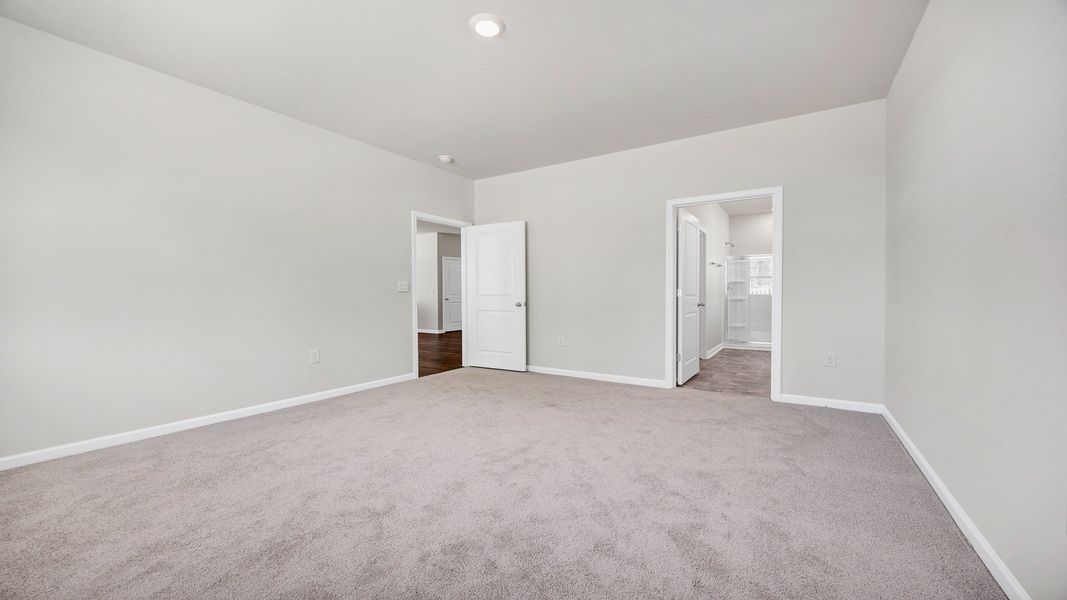 Spacious, unfurnished interior of a new home in Sease's Pond, Gilbert (Image 20).