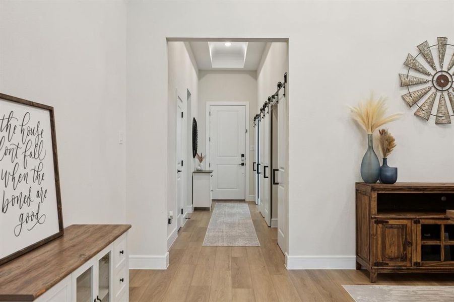 Entryway with tray ceiling and take a peek at those sliding barn doors! Entryway with tray ceiling and take a peek at those sliding barn doors!