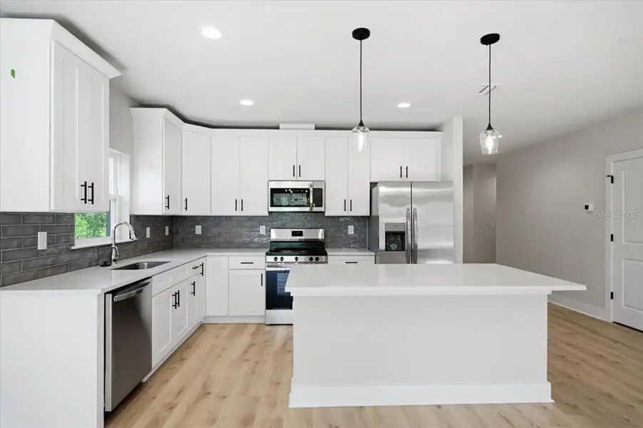 Furnished interior view inside a new home in , Weeki Wachee (Image 3).