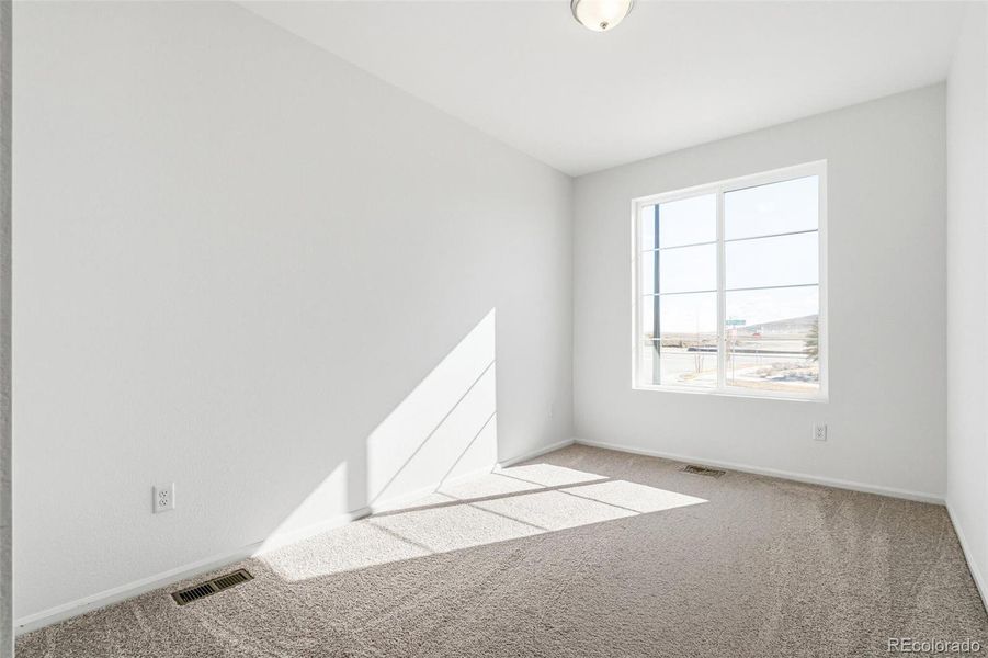 Spacious, unfurnished interior of a new home in Legato, Commerce City (Image 14).