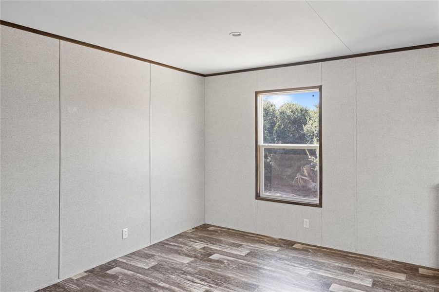 Spare room featuring light hardwood / wood-style floors