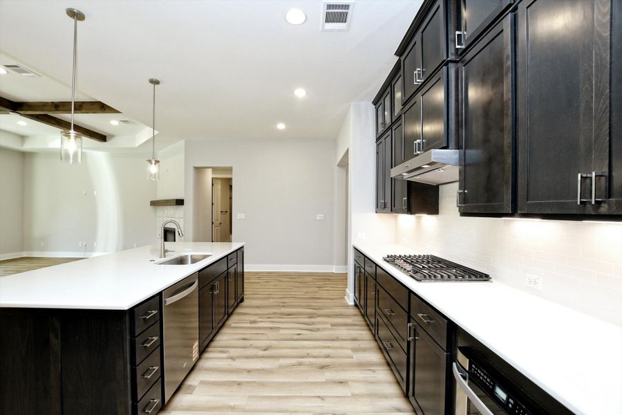 Furnished interior in a model home at Burnet Hilltop Estates in Cedar Park (Image 22).