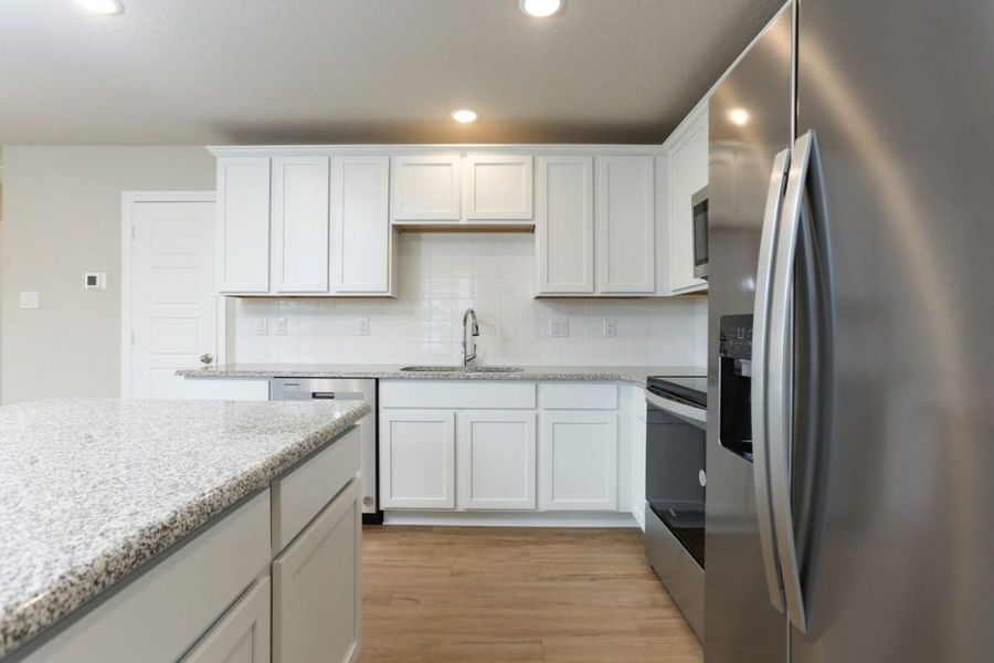 Representative furnished interior of a home built from the Harris Colony At Pinehurst by Brohn Homes in Colony at Pinehurst, Pinehurst (Image 8).