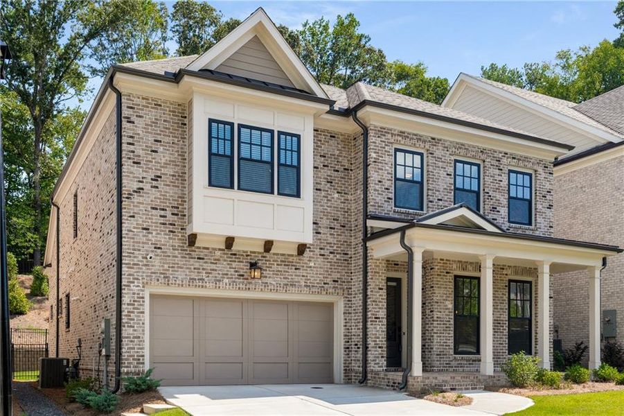 Front exterior of a new home in , Johns Creek, GA, highlighting curb appeal (Image 20). Front exterior of a new home in , Johns Creek, GA, highlighting curb appeal (Image 20).
