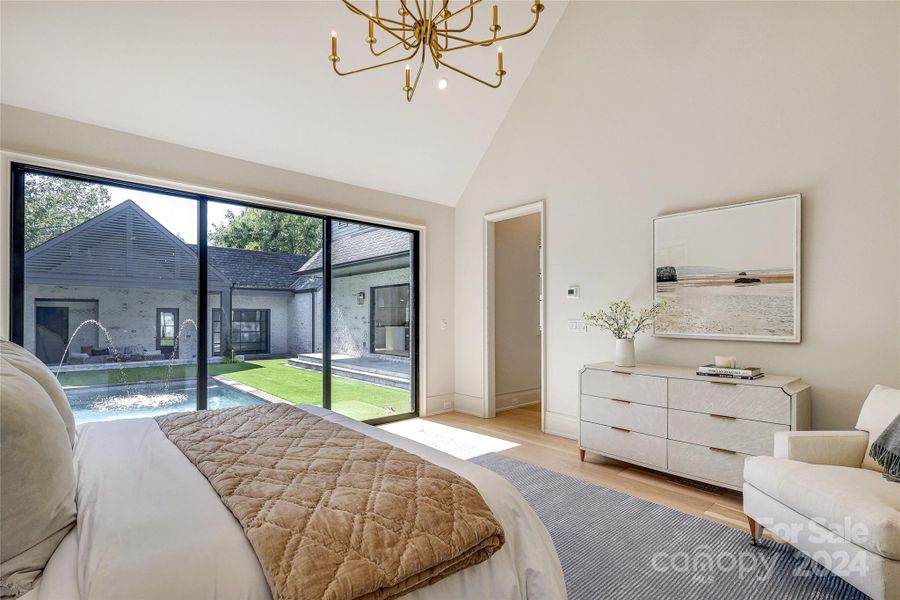 Glass doors open to pool area