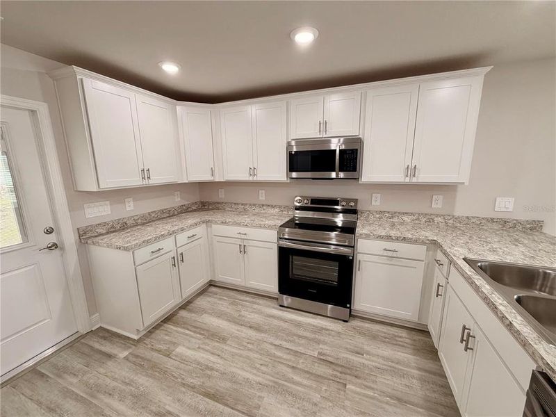 Furnished interior view inside a new home in , Lake Wales (Image 5).