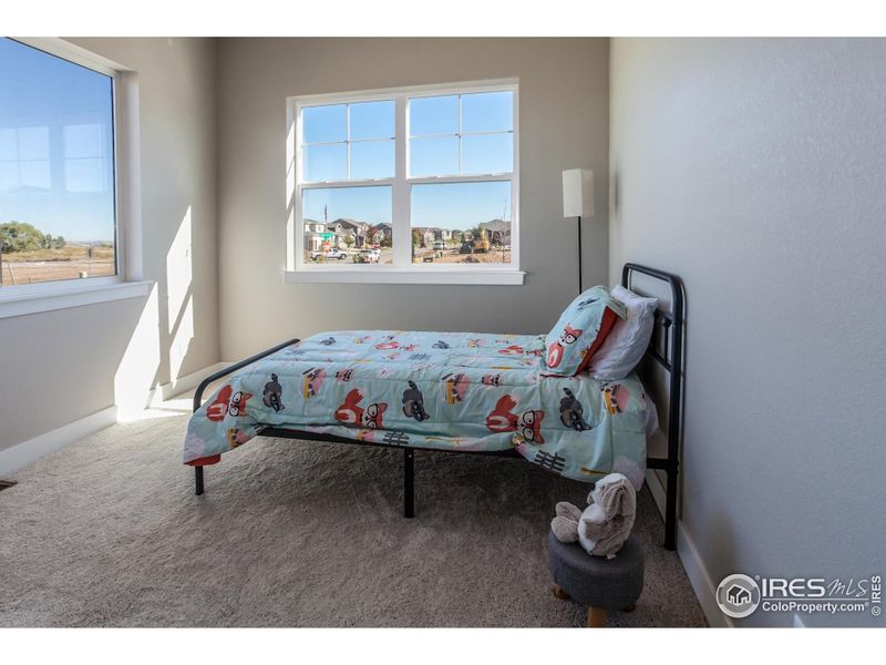 Furnished interior view inside a new home in Promontory Point, Greeley (Image 6).