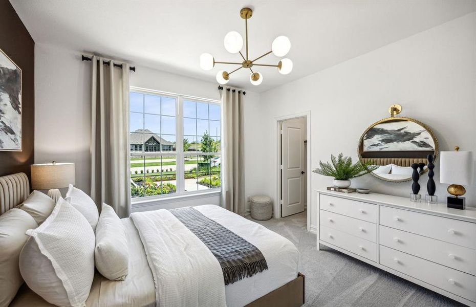 *actual home, furniture not included - Spacious secondary bedroom with large windows