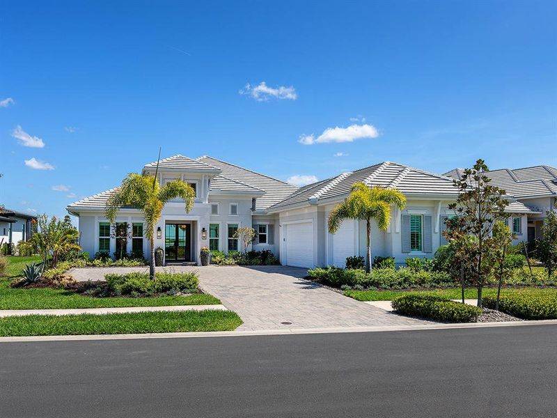 Front exterior of a new home in , Sarasota, FL, highlighting curb appeal (Image 22).