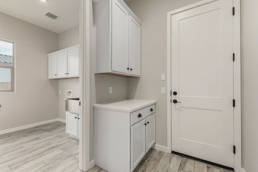 Furnished interior view inside a new home in Valencia at Granite Vista, Waddell (Image 13).