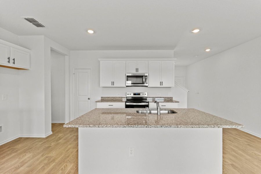 Furnished interior view inside a new home in Palomino, Manor (Image 8).