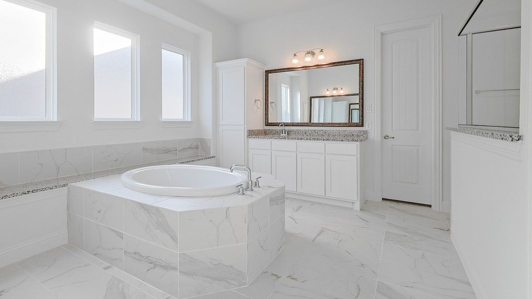 Representative furnished interior of a home built from the Villanova by DRB Homes in Creekhaven, Iowa Colony (Image 10).