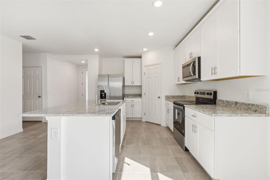 Furnished interior view inside a new home in Springs at Lake Alfred - Signature Series, Lake Alfred (Image 5).