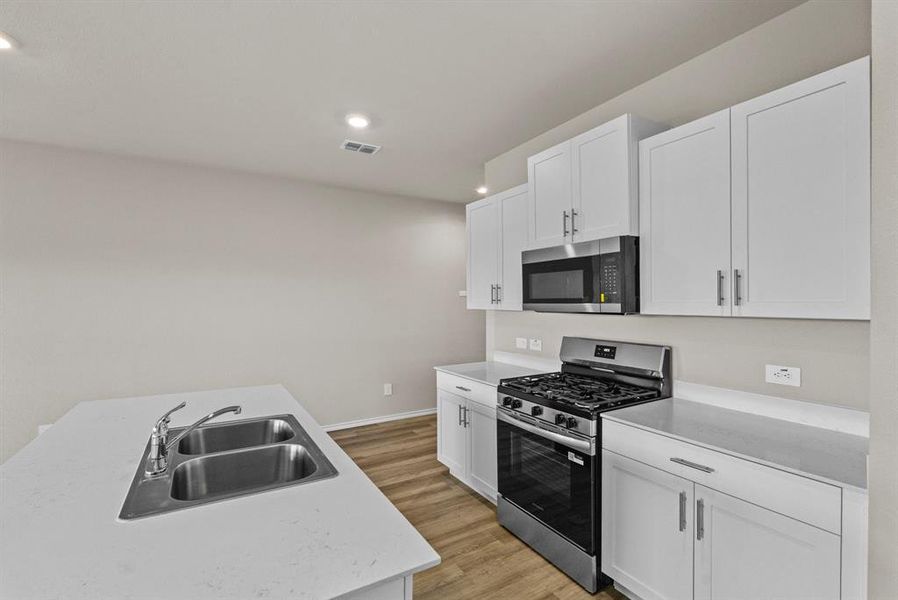 Furnished interior view inside a new home in Sunnycreek, Crowley (Image 9).