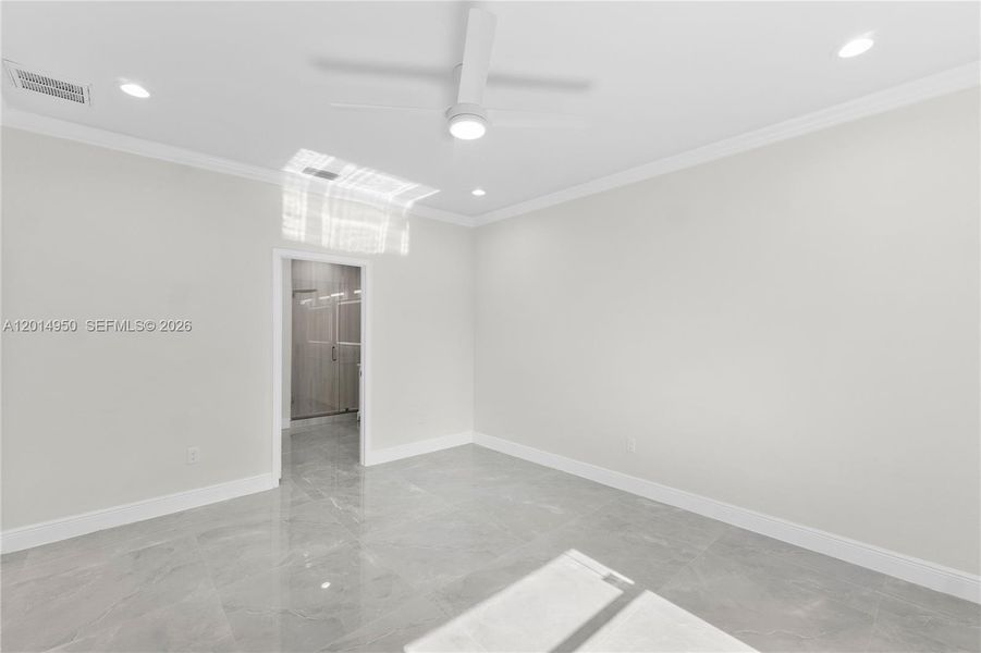 Primary bedroom with natural light