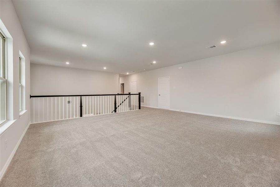 Spacious, unfurnished interior of a new home in Valencia On The Lake, Little Elm (Image 27).