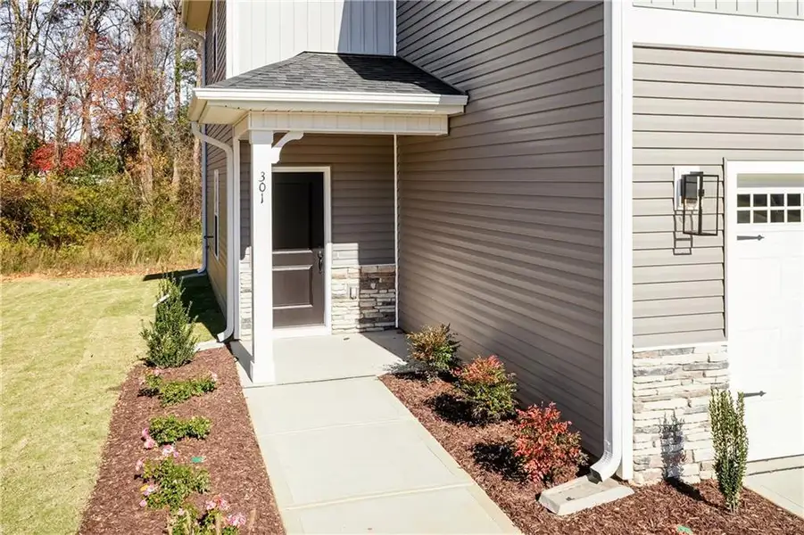 Exterior details and patio area of a home in Magnolia Villas, Cornelia (Image 21). Exterior details and patio area of a home in Magnolia Villas, Cornelia (Image 21).