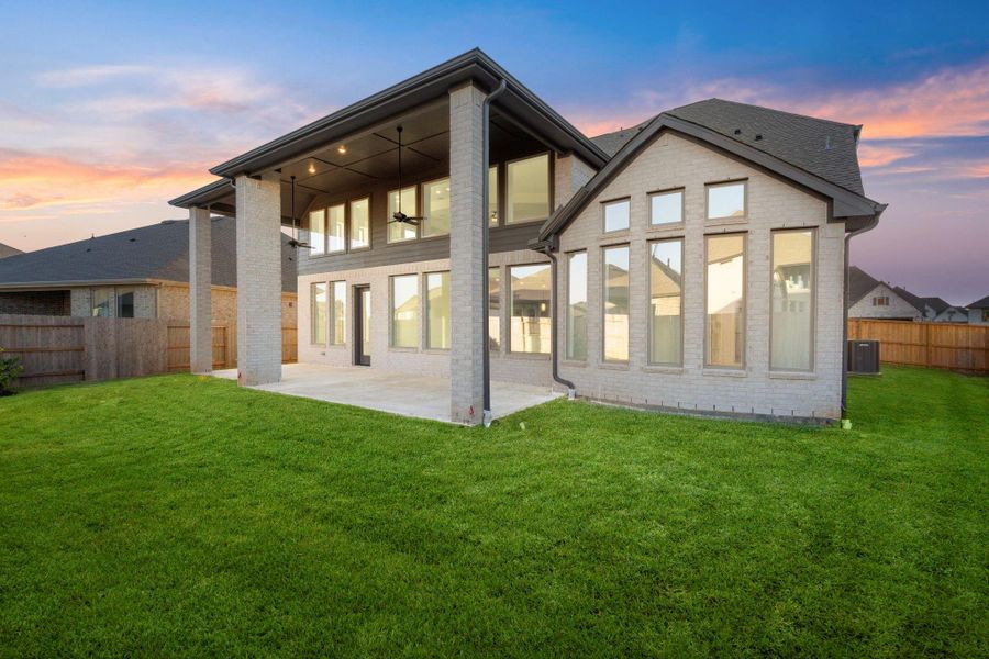 Exterior details and patio area of a home in Coastal Point, League City (Image 21).