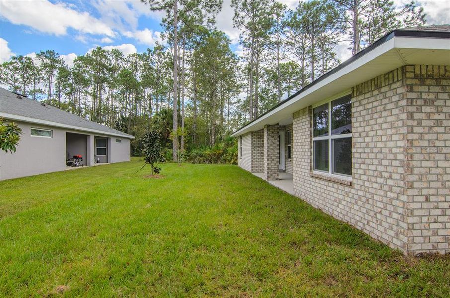 Exterior details and patio area of a home in , Palm Coast (Image 24).