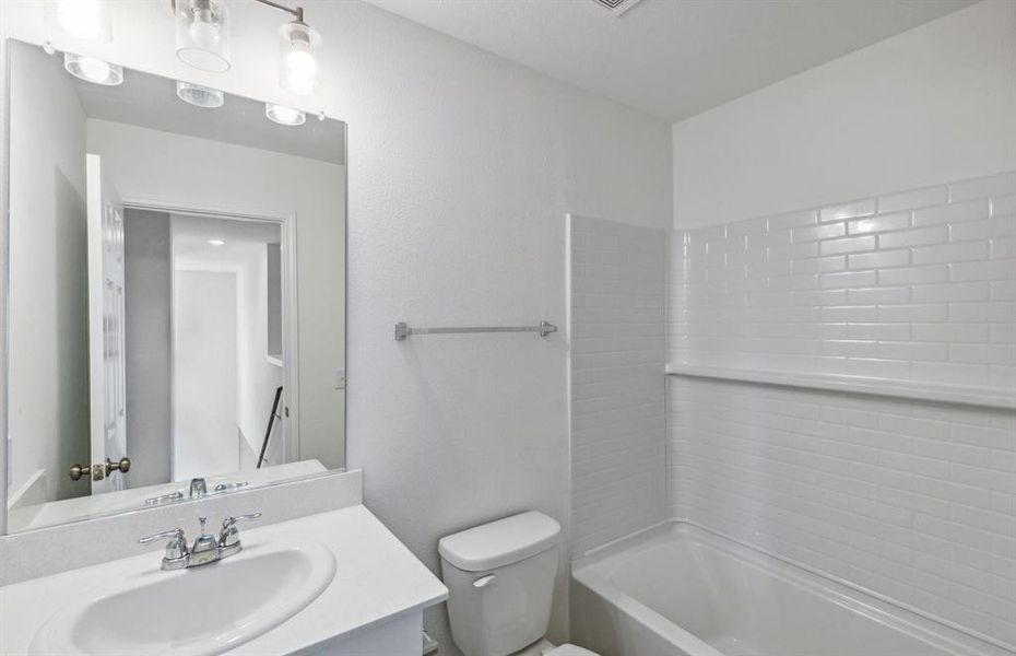 Spacious secondary bathroom *real home pictured