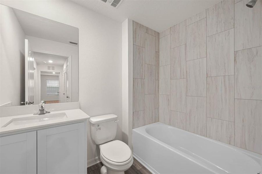 Furnished interior view inside a new home in Sol Vista, Dundee (Image 11).