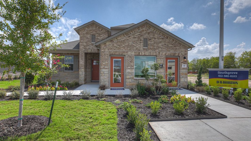 Representative exterior photo of a completed home built from the The Roosevelt by D.R. Horton in Southgrove, Kyle, TX (Image 1). Representative exterior photo of a completed home built from the The Roosevelt by D.R. Horton in Southgrove, Kyle, TX (Image 1).