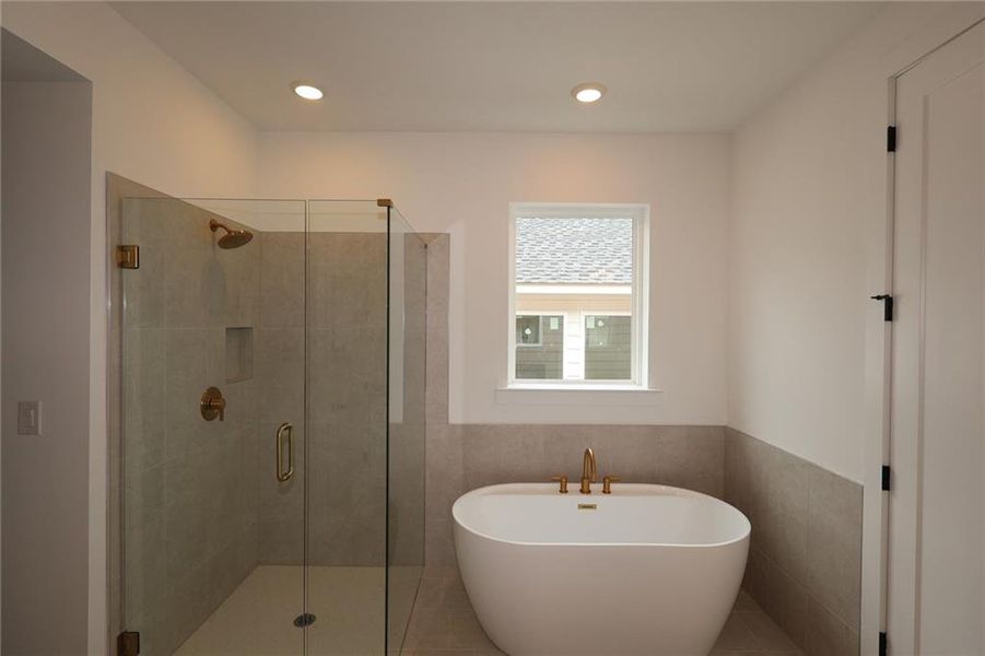 Furnished interior view inside a new home in Maple Grove at Towne Lake, Woodstock (Image 6).